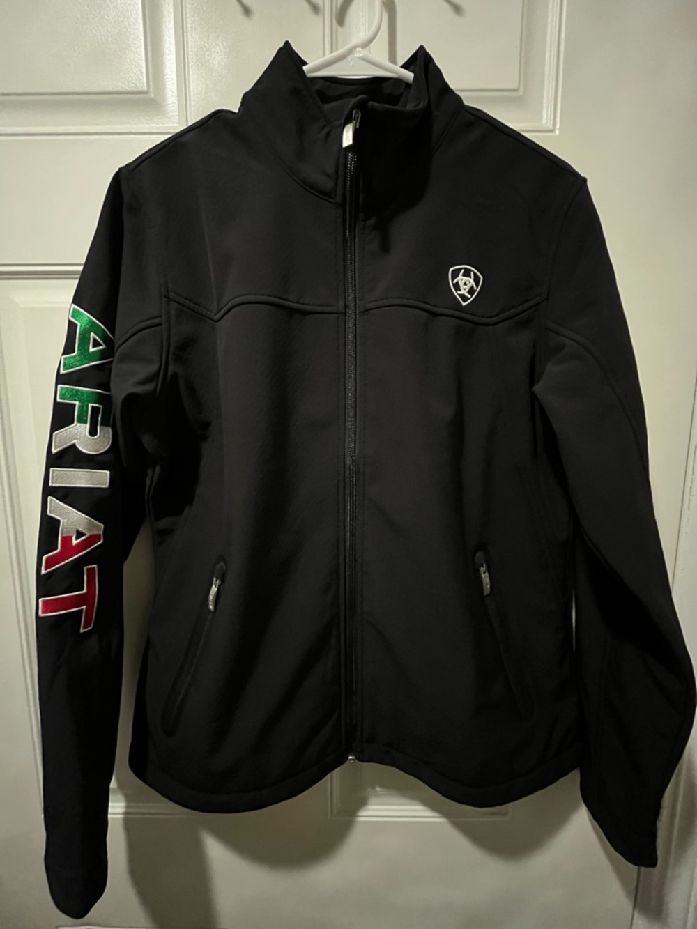 Ariat Women’s Black Softshell Jacket with Mexican Flag Sleeve Logo